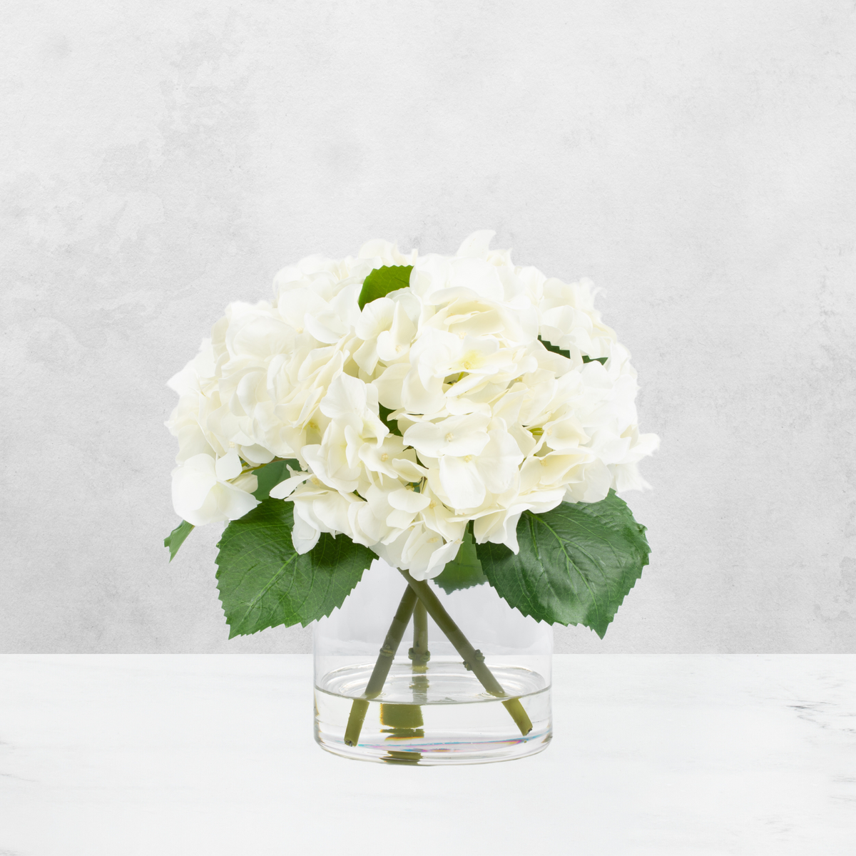Cream-White Hydrangea Arrangement in Glass Vase — 13″
