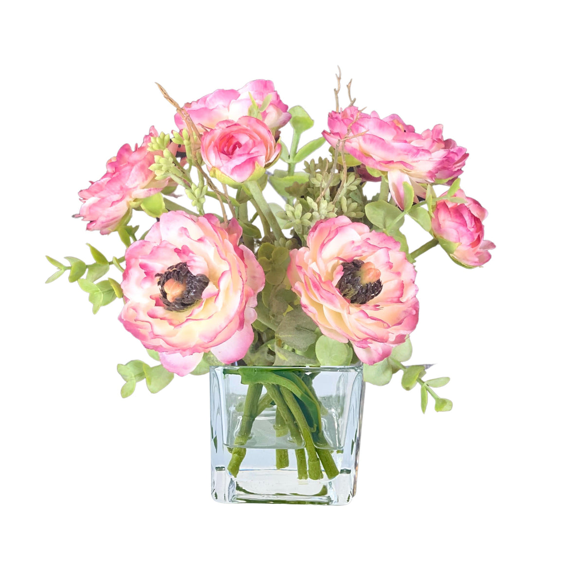 Pink ranunculus arrangement in a clear cube glass vase, 8 inches high