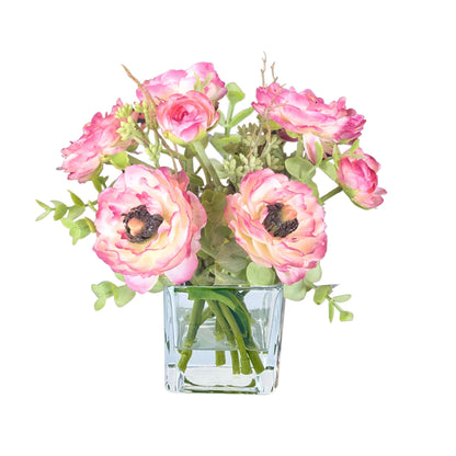 Pink ranunculus arrangement in a clear cube glass vase, 8 inches high