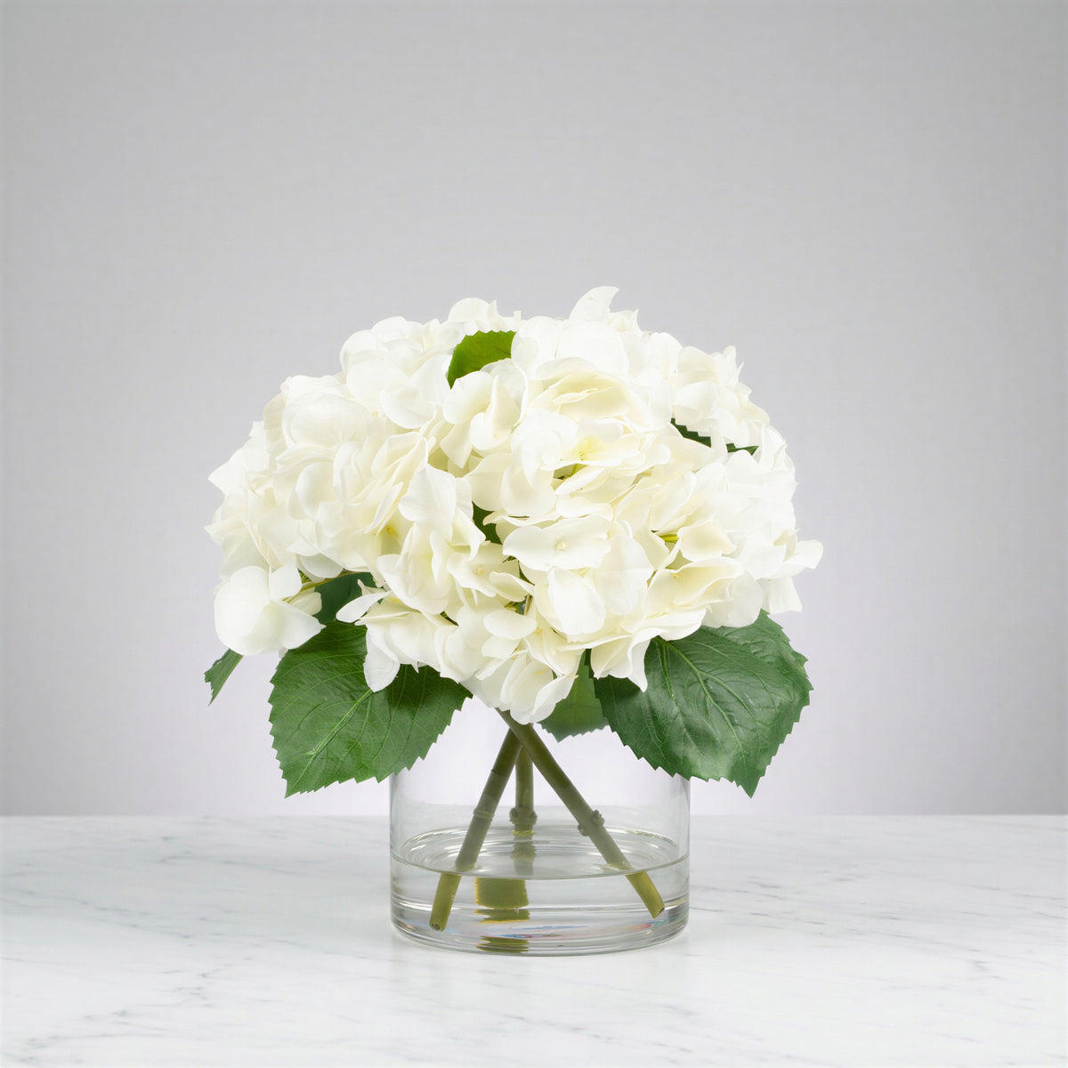 Cream-White Hydrangea Arrangement in Glass Vase — 13″